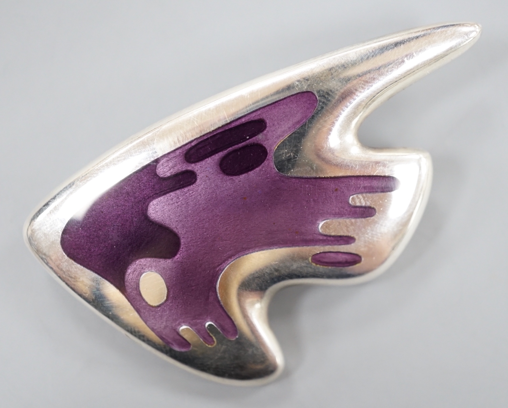 A Henning Koppel for Georg Jensen sterling and enamel stylised fish brooch, no. 307, 57mm.